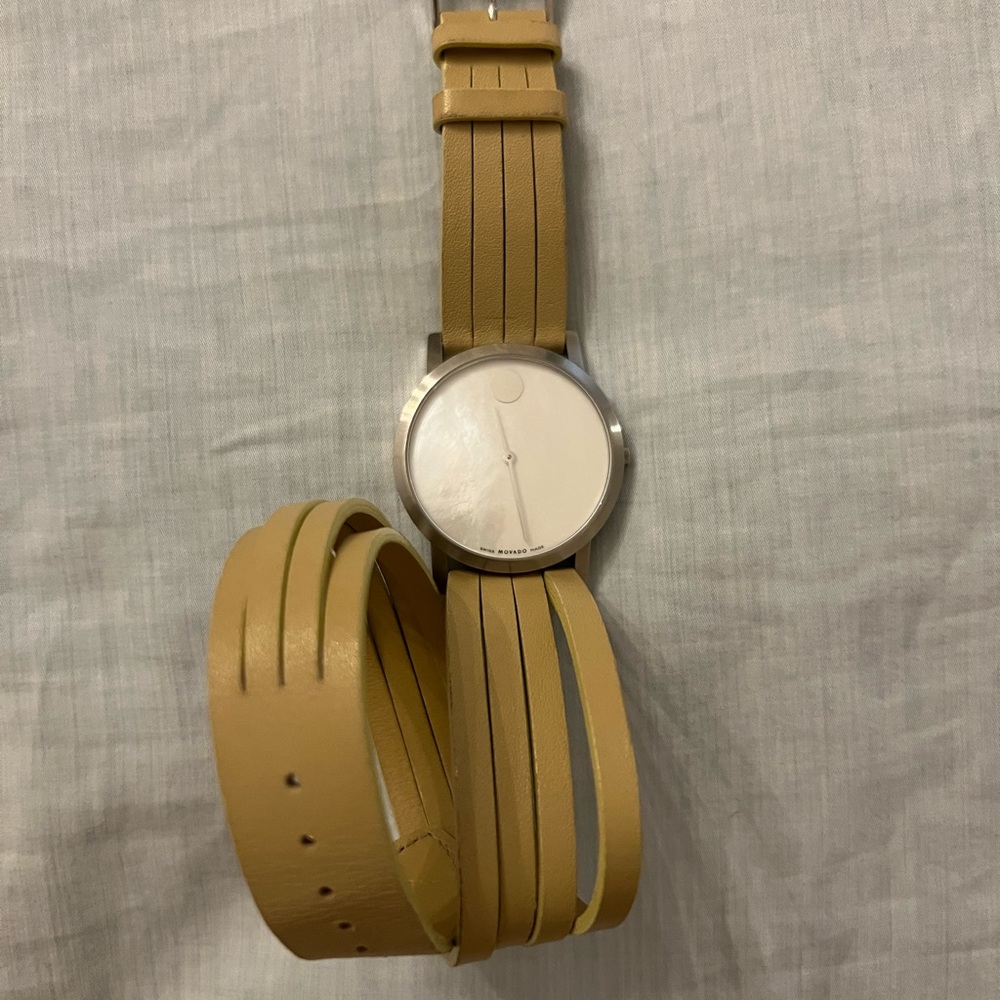 Stainless water resistant sapphire crystal Movado watch.